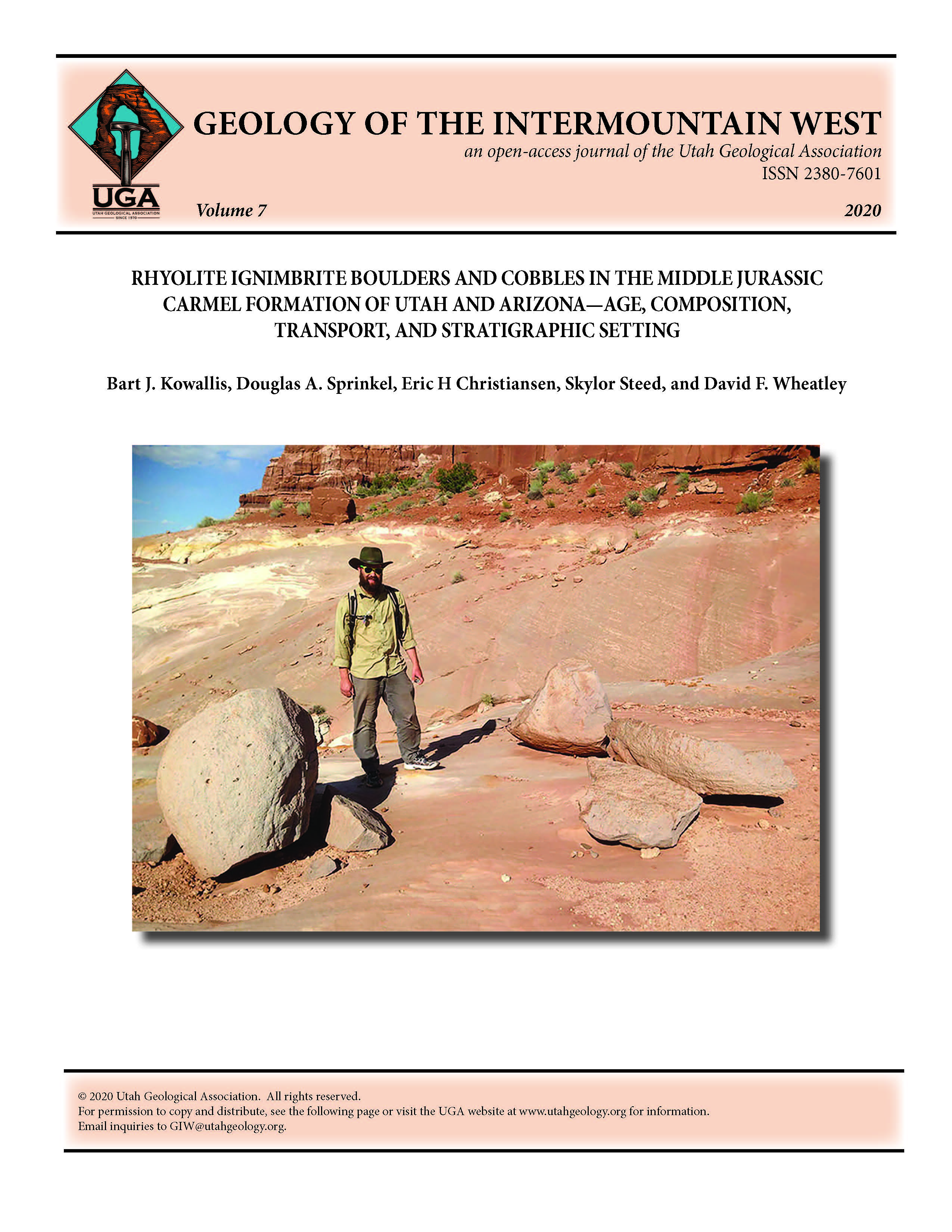 Large, rounded igneous, boulder-sized clast from near where sample WH-1 was collected in the White House area, Kane County, Utah. The boulder has broken into several large pieces having maximum diameters of 1.3, 1.0, and 0.8 m with several other 0.5 m blocks and is compositionally similar to other igneous clasts in the area. These igneous clasts are weathered out from deris- flow beds within the Paria River Member of the Carmel Formation. David Wheatley for scale. Photograph by Mark Hansford.